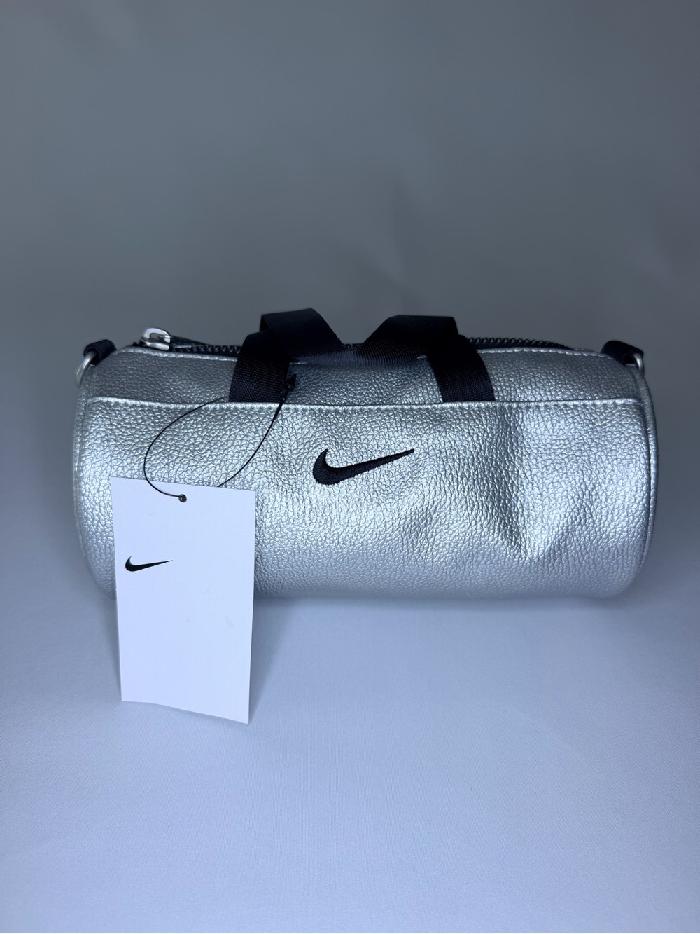 Nike Silver Mini Crossbody Barrel Bag with Black Accents